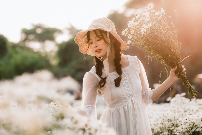 Woman practicing yoga at sunrise